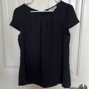 LOFT black blouse with cap sleeves and pleating. Size L